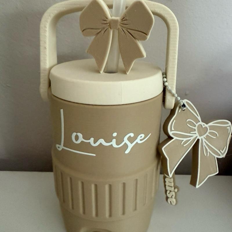 Can cooler, can holder, drink holders with lid and handle holds any 330ml can. Other colours to choose from Drinkware Colorful Printed. Keyring not included but can be brought separately. Add on option to include can opener and straw topper.