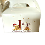 Cardboard party boxes in white with a personalised picture on the front perfect for a Christmas Eve box.