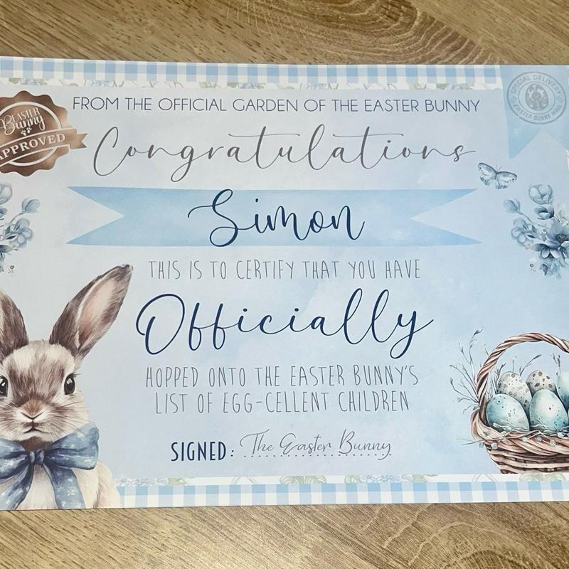 Pink, blue or yellow certificate personalised from the Easter bunny
