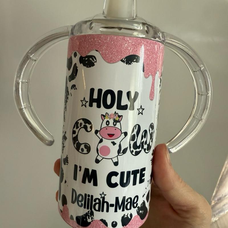 12oz insulated double walled sippy cup/tumbler for hot and cold drinks. With handles, 2 lids one sippy lid and one lid to use with straw that’s also included