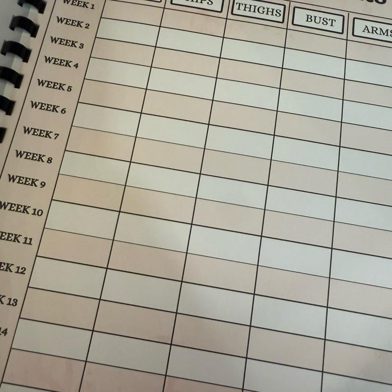 weight loss planner/journal with 15 different pages included to keep you on track