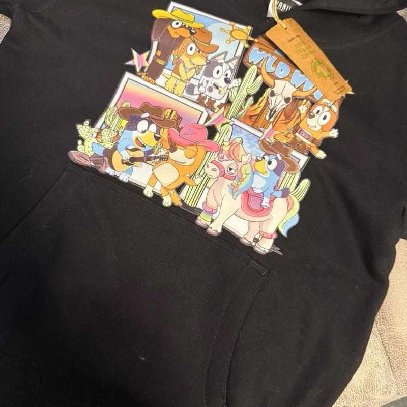 Wild West dog black hoody for children, picture detail is on the chest and the back of the one arm. The hoodie is made from organic cotton