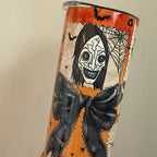 Orange Adult Girl Doll 20oz Tumbler with Halloween Design and Bow Detail-with lid and straw and for hot and cold drinks