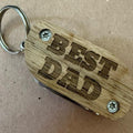 Engraved Best Dad Wooden Keychain keyring with Multi-Tool Features and torch  Ideal for Father's Day Gifts, best dad can be changed to something else. 5 multi tools and a torch. Perfect gift, comes with nail file, and bottle openers and a torch inside