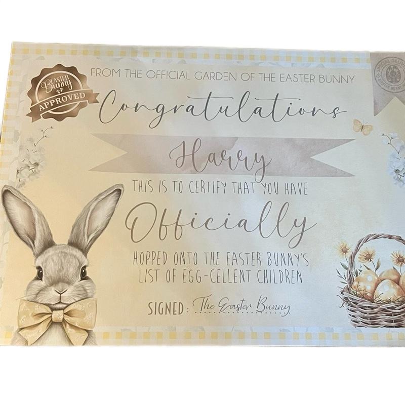 Pink, blue or yellow certificate personalised from the Easter bunny