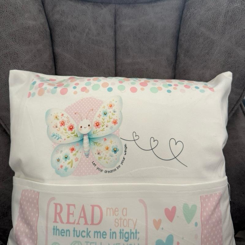 Cute personalised butterfly pocket book cushion. Children’s reading cushion. Cute nursery cushion