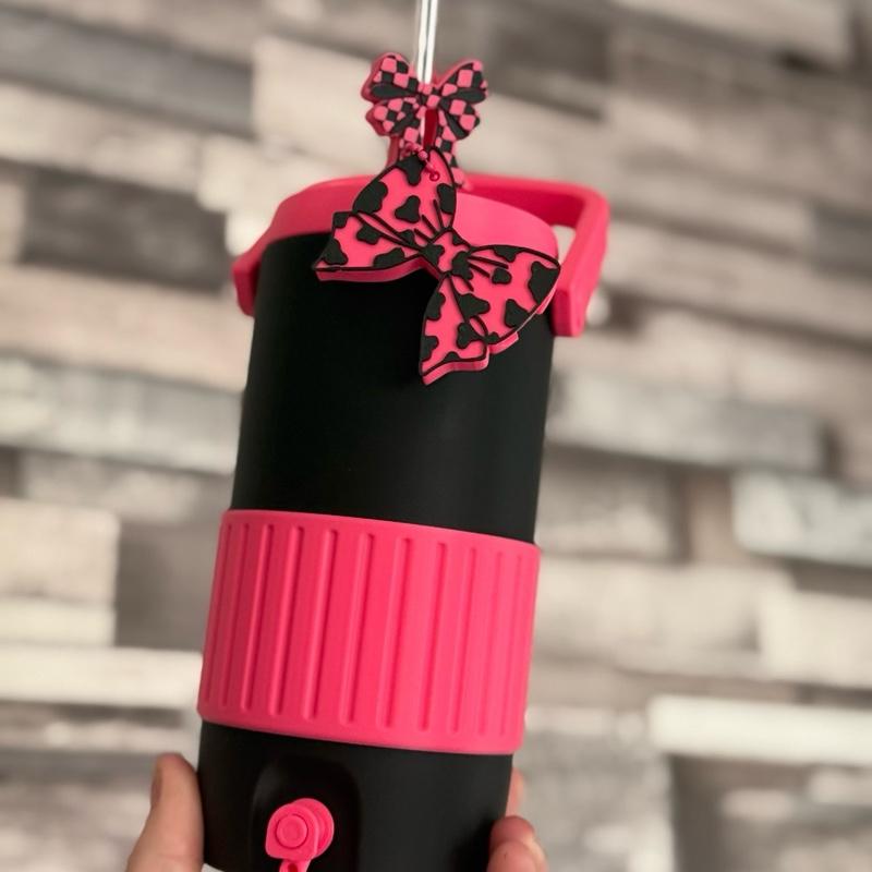 Personalised 500ml can holder/can cooler in pink and black with straw topper and can opener
