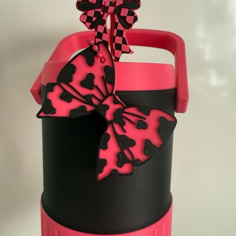 Personalised 500ml can holder/can cooler in pink and black with straw topper and can opener
