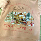 Young girls sweatshirt with frilly arms in a dusty pink with polar express themed