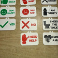 plastic 3d printed communication cards for assisting non-verbal adults and children, english language. Comes on a breakaway lanyard and you can chose between 3 and 11 of the cards in the pictures to match the colour of chosen lanyard. Message once ordered