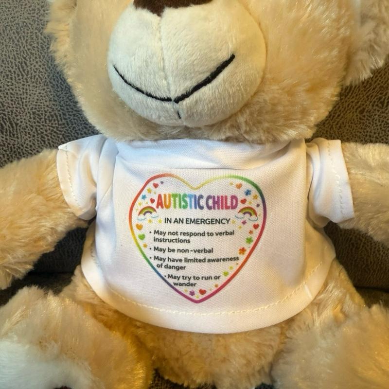 Teddy bear soft toy, with a removable t shirt for children with autism to outline dangers in an emergency. Soft toys for sen children, aids for sen children