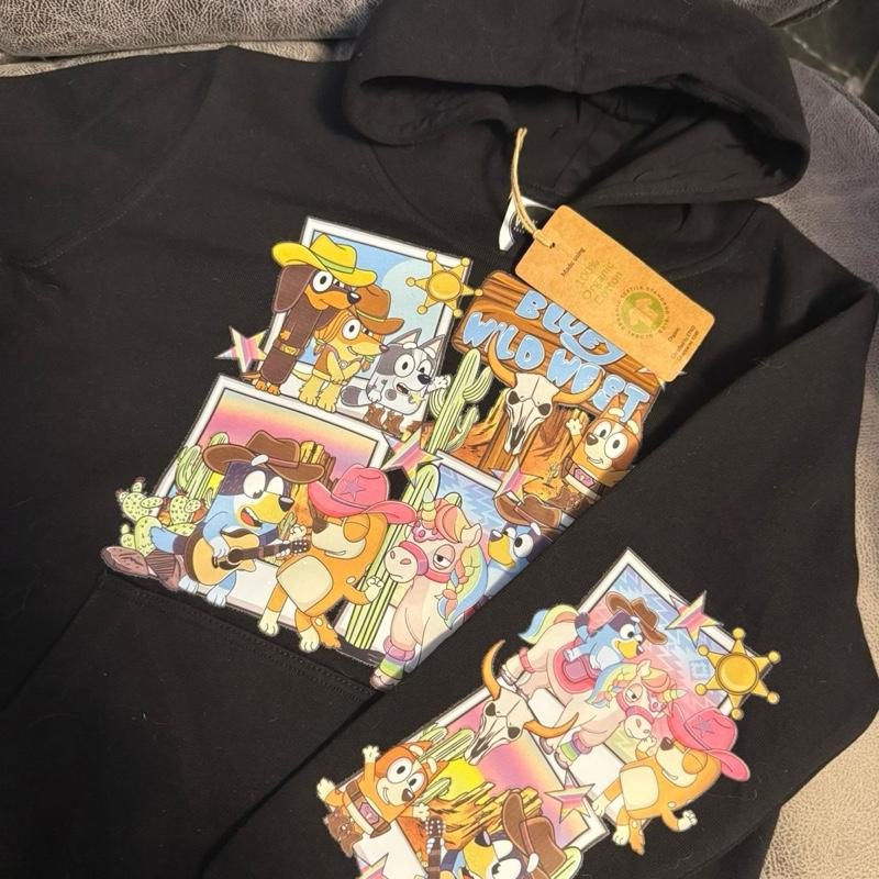 Wild West dog black hoody for children, picture detail is on the chest and the back of the one arm. The hoodie is made from organic cotton