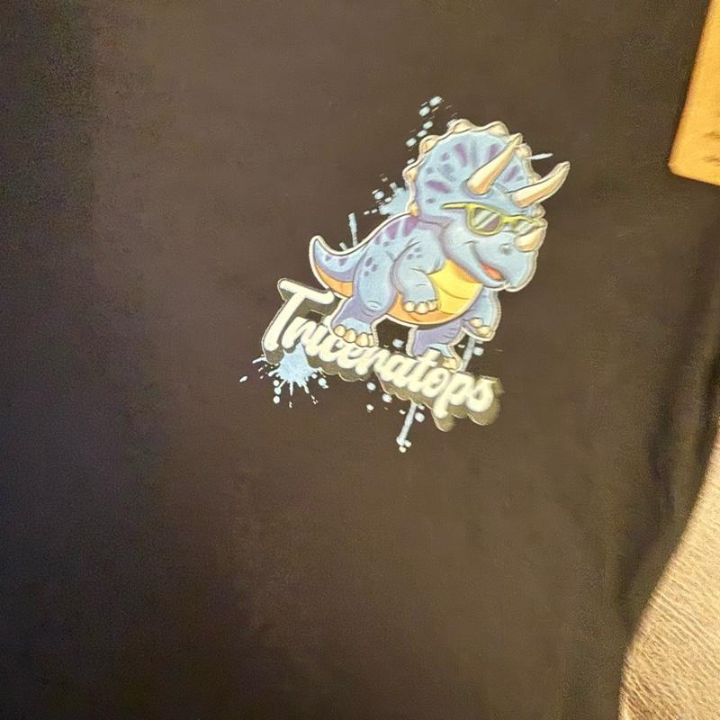 Dinosaur T-shirt with Small Pocket Sized Image on Front and Large Prehistoric Edition Image on Back. Made with organic cotton
