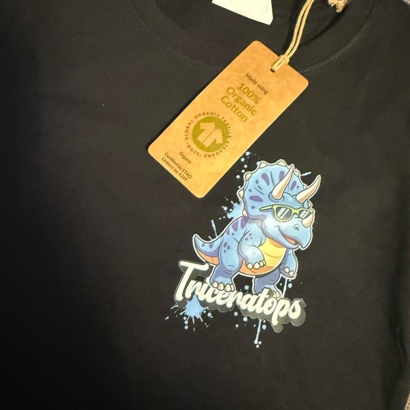 Dinosaur T-shirt with Small Pocket Sized Image on Front and Large Prehistoric Edition Image on Back. Made with organic cotton