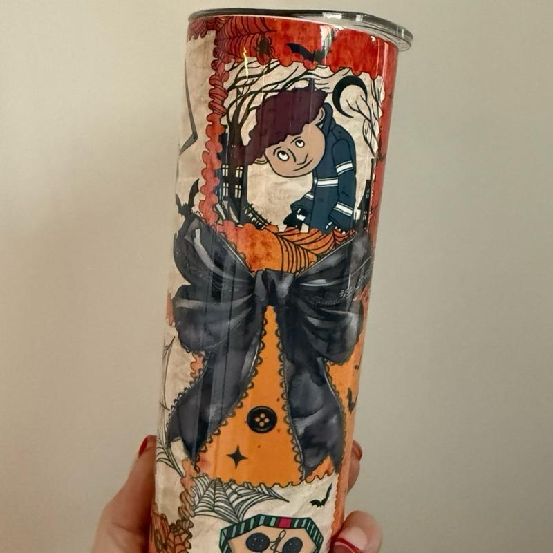 Orange Adult Girl Doll 20oz Tumbler with Halloween Design and Bow Detail-with lid and straw and for hot and cold drinks