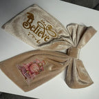 Beautiful cream velvet hair clip Christmas themed train one side and believe